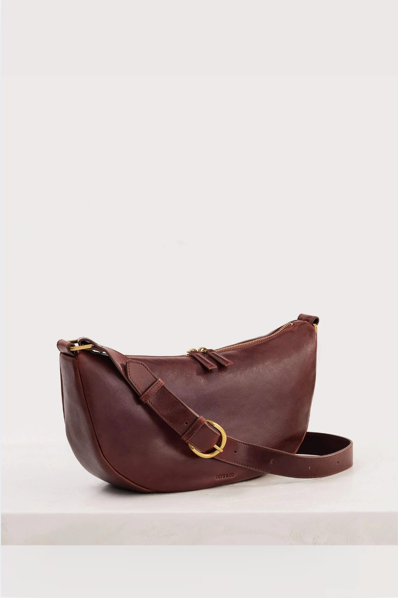 JUJU & Co Crescent Sling Leather bag in Maple