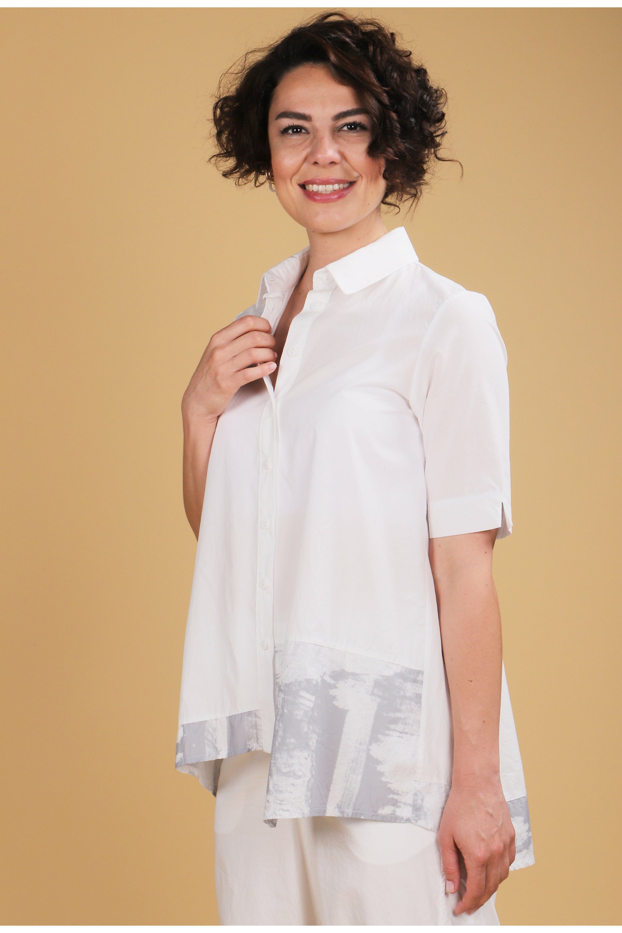 Luukaa Clothing Shirt in Ecru with contrast print hem.